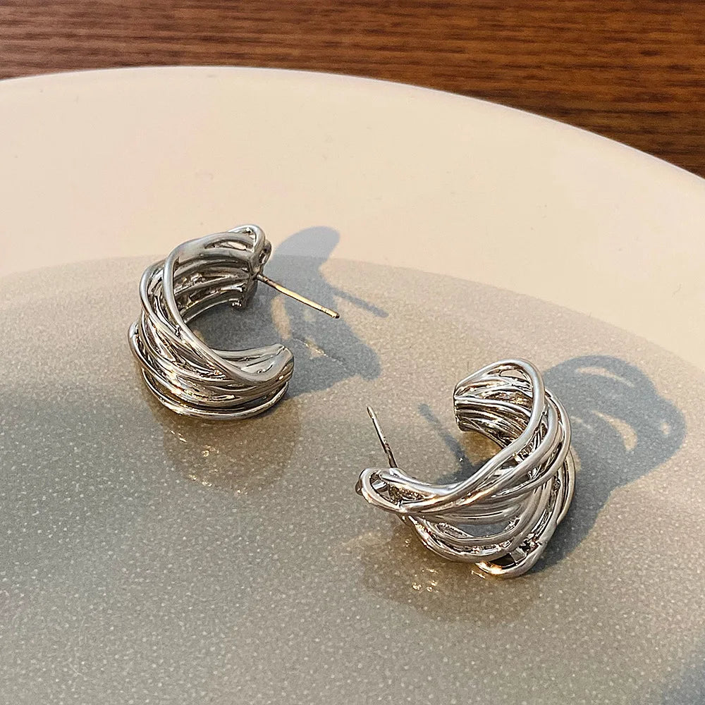 Boucles d'oreilles créoles contemporaines 