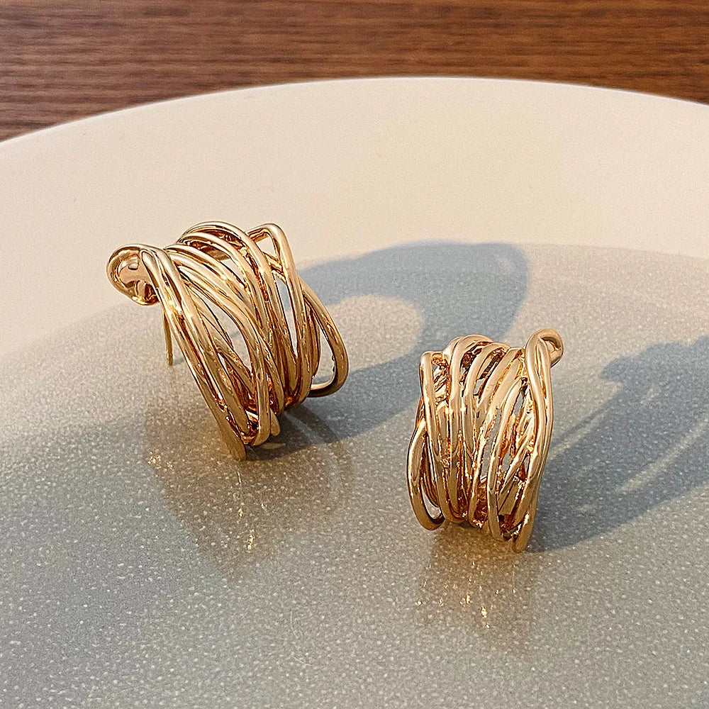 Boucles d'oreilles créoles contemporaines 